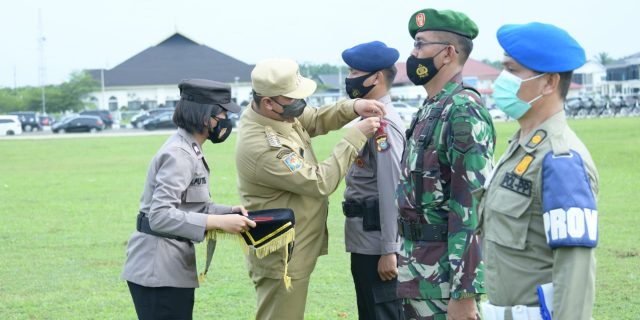 Bupati Labura Pimpin Apel Pasukan Operasi Mantab Huta Untuk Pengamanan Pilkades
